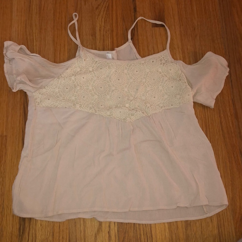 Cream colored open shoulder top